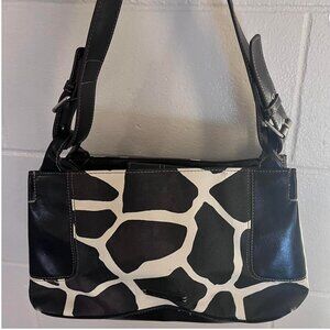 Nine & CO cow print purse.